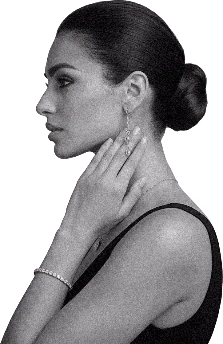 Model wearing Dalia Qazaz earrings and bracelet
